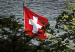 Schweizisk Flagga, Foto: AFP PHOTO / FABRICE COFFRINI / AFP / FABRICE COFFRINI